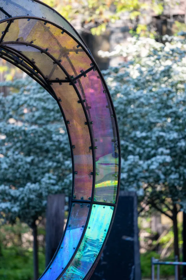A detail shot of the Arriving Home sculpture by Dennis Oppenheim. The sculpture is steel and acrylic and is designed to shimmer and change color based on the sun’s position.